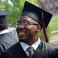 A graduate in cap and gown