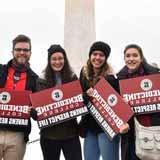 Pro-life students hold signs in front of the Washington Monument