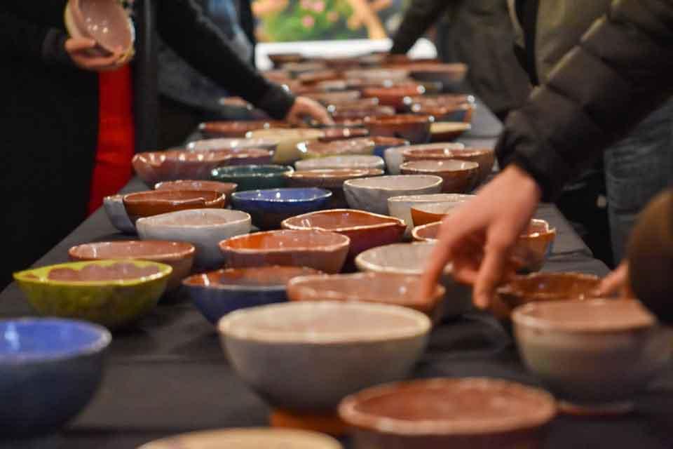 A set of ceramic bowls laid out on a table