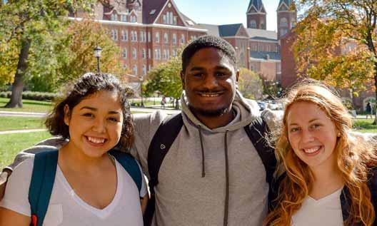 Students posing for a photo on campus