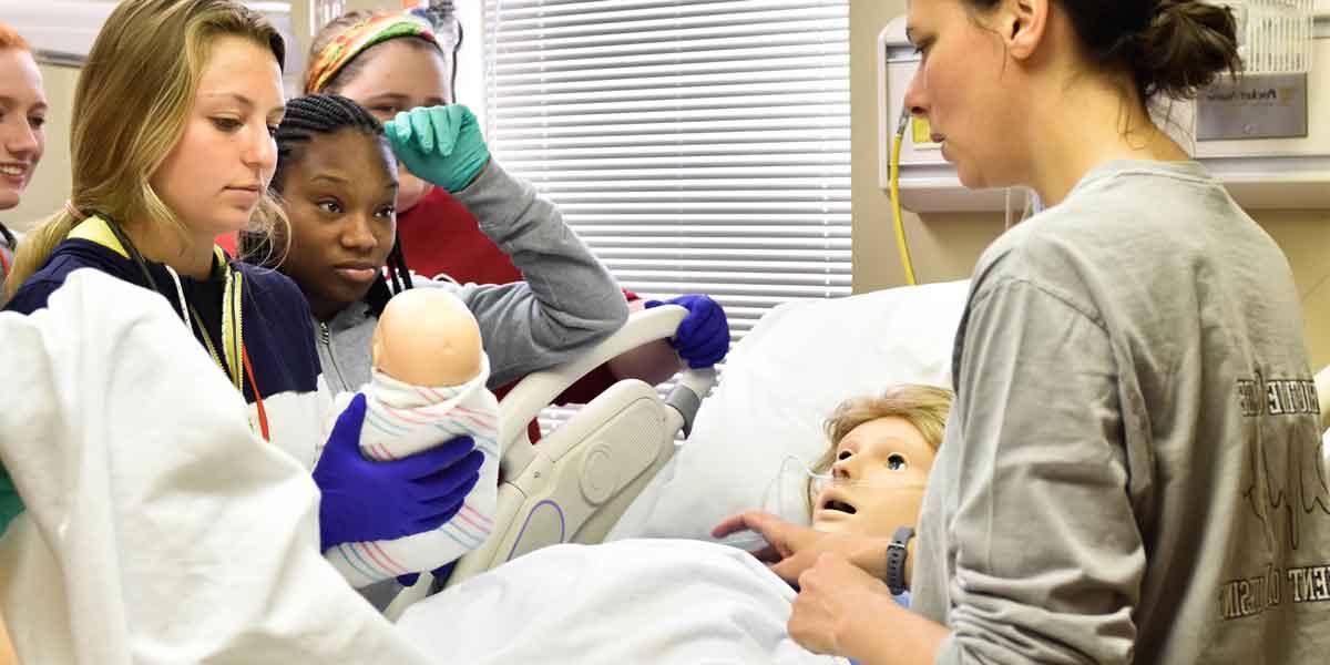 BCYC Immersion participants learn how to care for a woman in labor and for her newborn child