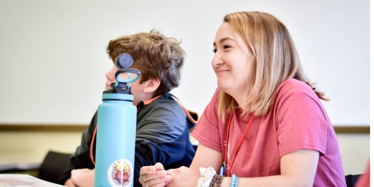 A BCYC Immersion student smiles in class